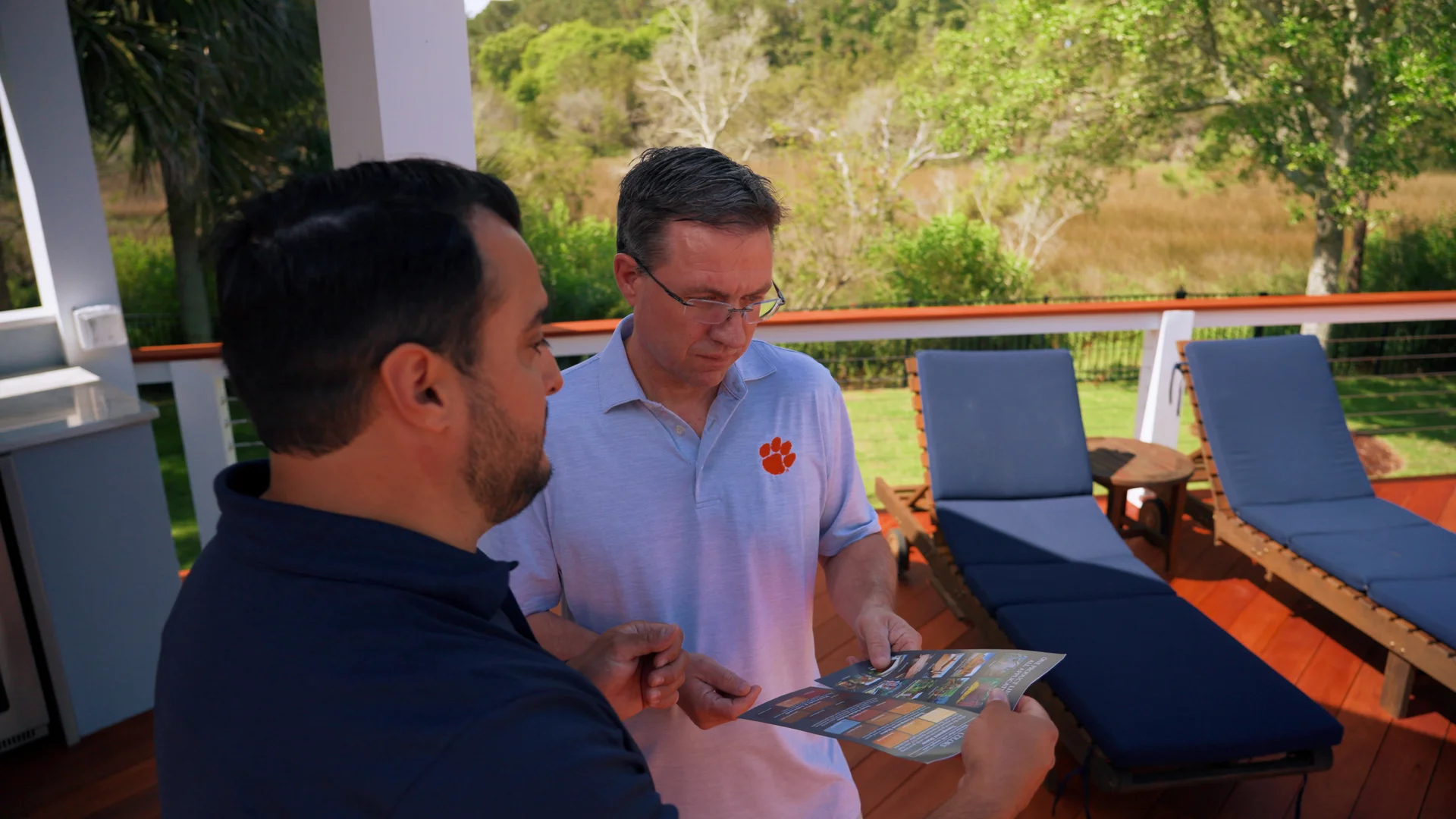 Ship Shape team consulting with a homeowner