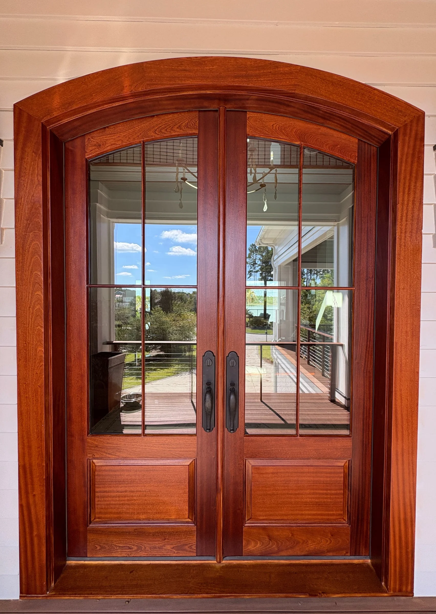 Beautifully refinished mahogany arched double door